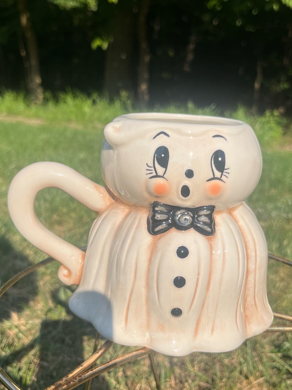 Peach Ghost Ceramic Mug with Black Bow Accent